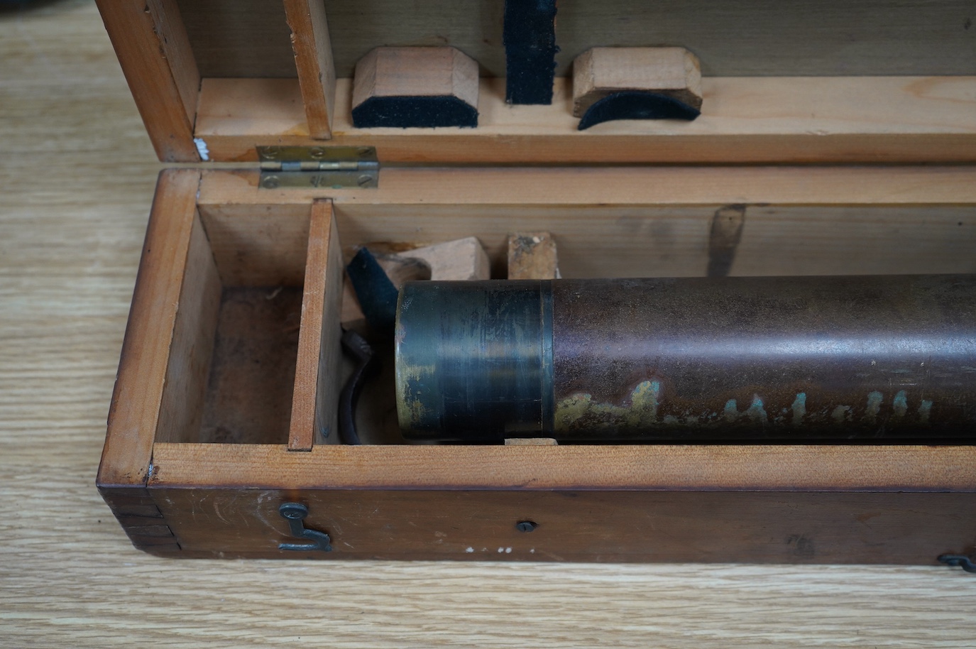 A First World War telescope gunsight by W. Watson & Sons Ltd., London, stamped S.S. Telescope x8 3348, and dated 1918, in its original pine case, sight 52cm long, case 68.5cm long. Condition - fair.
